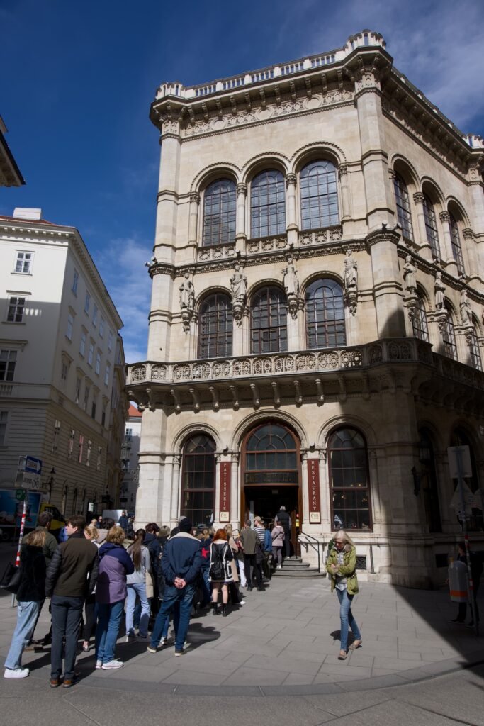 A queue outside Cafe Central in Vienna