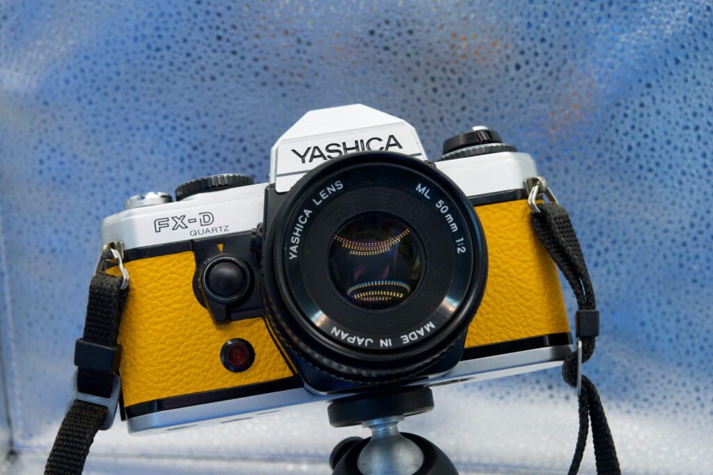 ashica FX-D Quartz, with sunshine yellow leather covering.