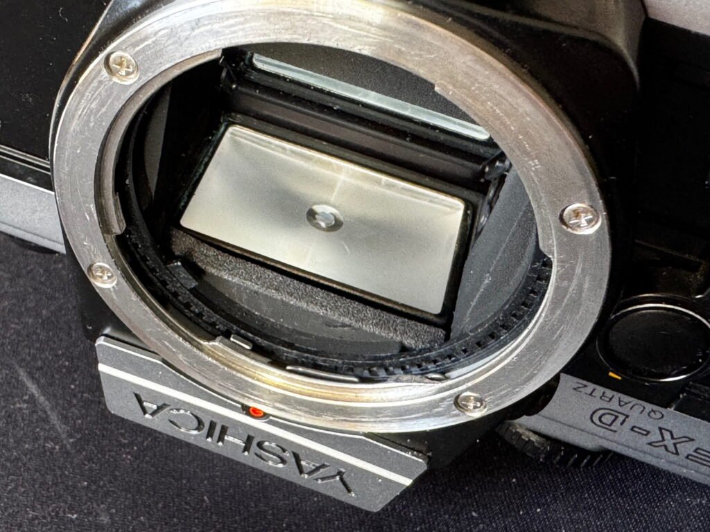 Yashica FX-D lens mount area, showing the focus screen and mirror buffer