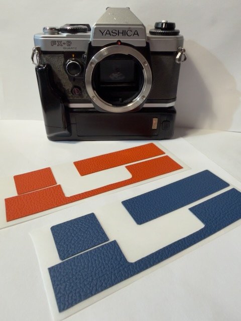 Yashica FX-D camera with motor drive and two colours of replacement skin