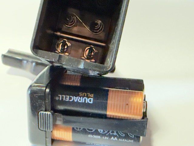 The Yashica FX Series motor drive battery compartment
