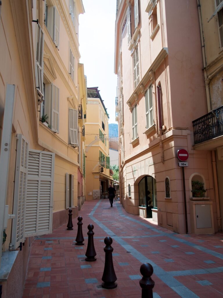 Pink stone houses in an alleyway